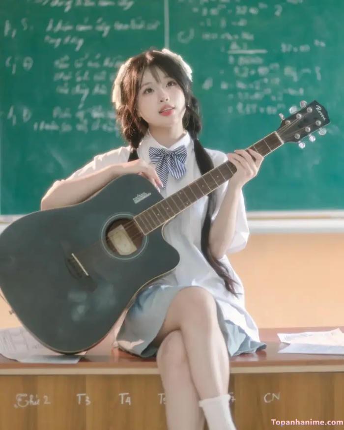 ảnh gái lớp 9 đánh đàn